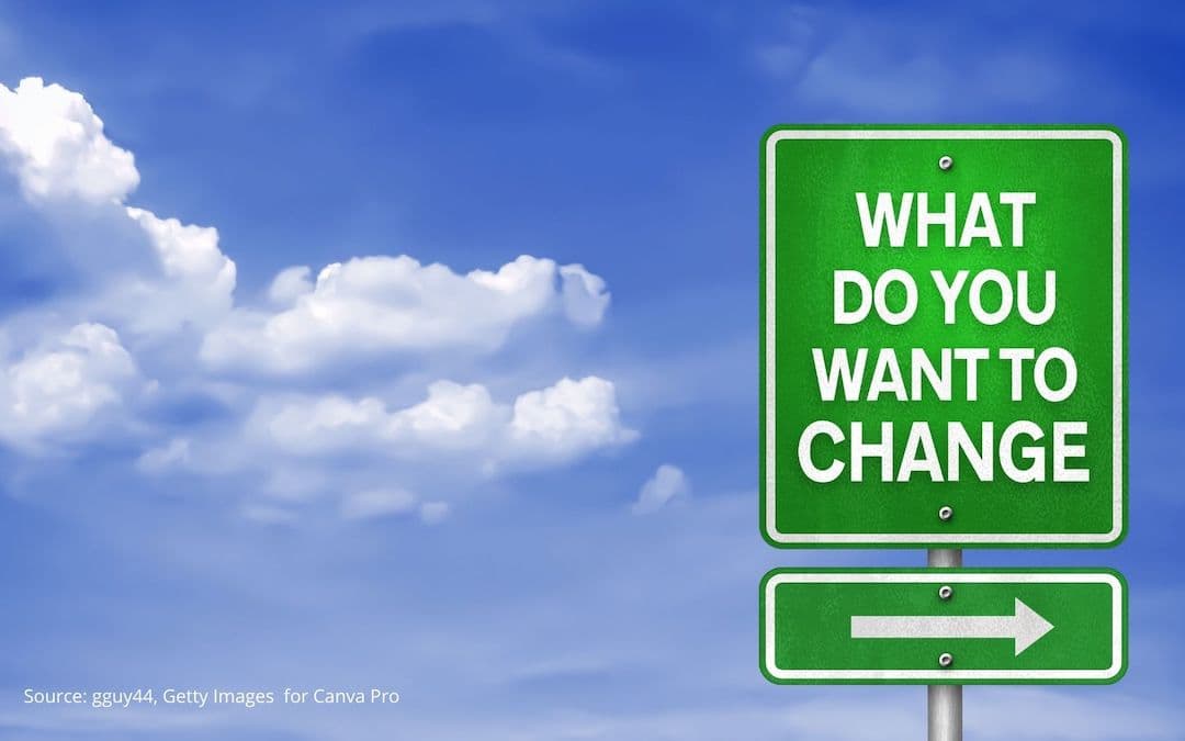 Sign post with the text "What do you want to change" to illustrate embracing positive change.