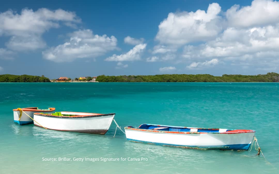 Boat anchored off an island in the Caribbean.