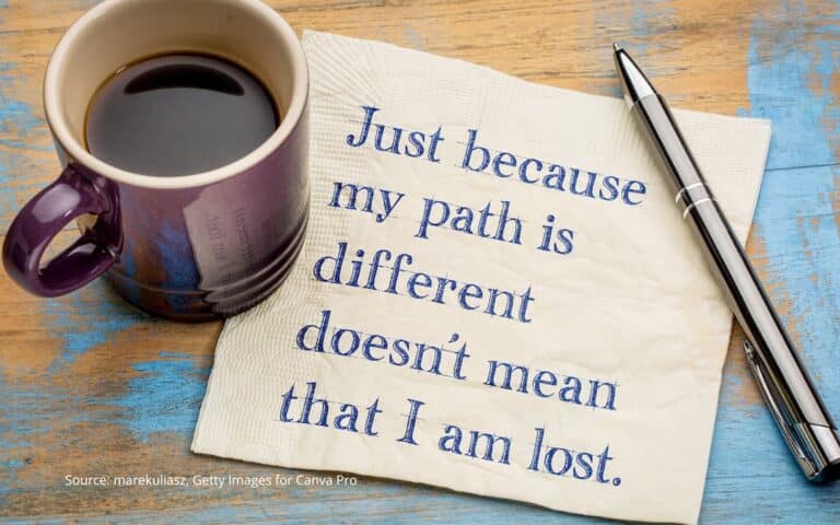 Mug and napkin text "Just because my path is different doesn't mean I'm lost." to illustrate cultural conditioning.