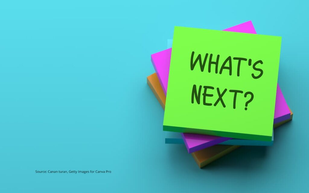 A post it note with the words "what's next" on it, to illustrate the arrival fallacy.