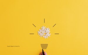 Puzzle pieces within a lightbulb shape to illustrate the challenge of communicating ideas effectively.